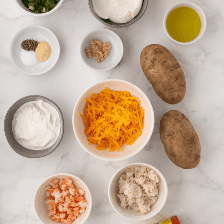 Ingredients needed for Shrimp Stuffed Baked Potatoes on kitchen table.