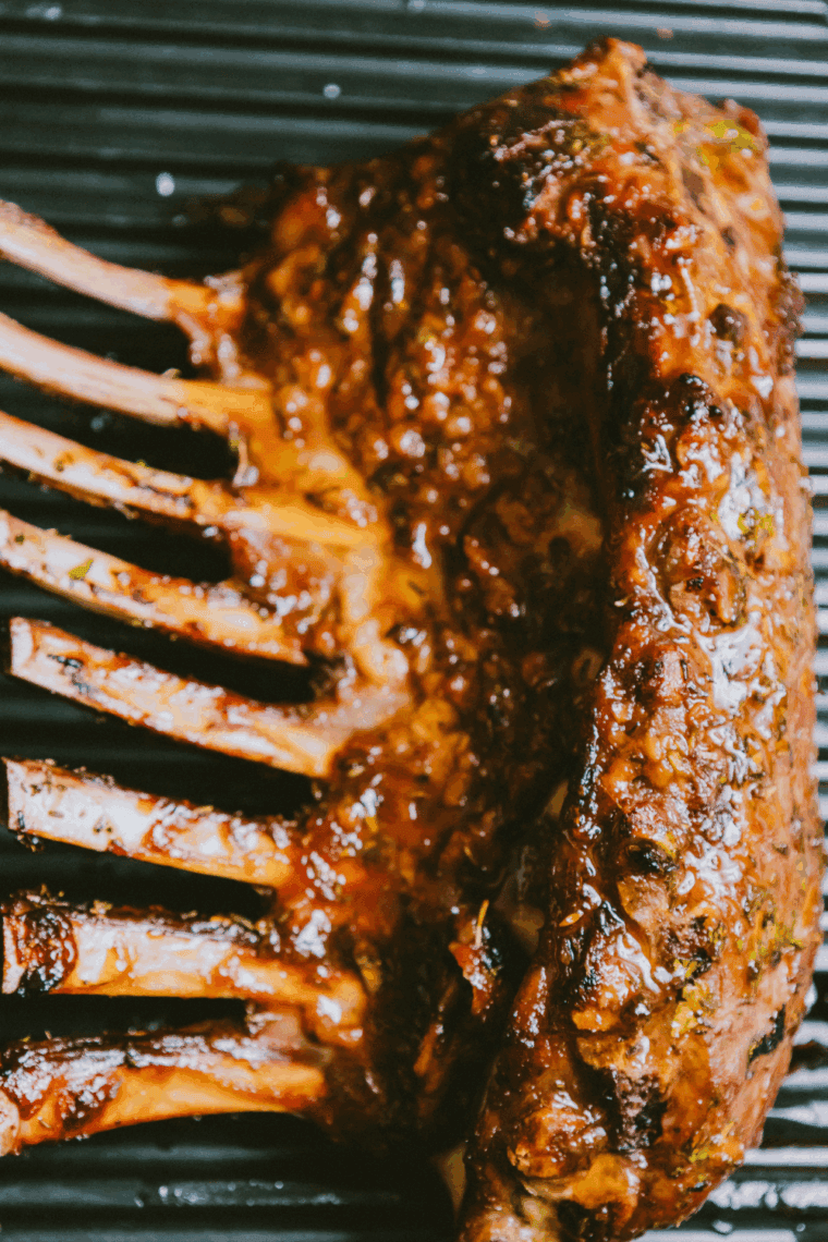 Perfectly seared lamb chops resting after Traeger grilling