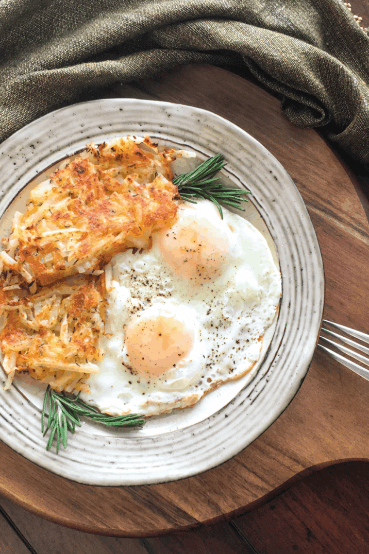 Crispy golden Waffle House-style hash browns served in a skillet with optional toppings.