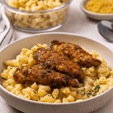 Crispy wings coated with copycat Wingstop hot honey rub served on a plate with dipping sauce.