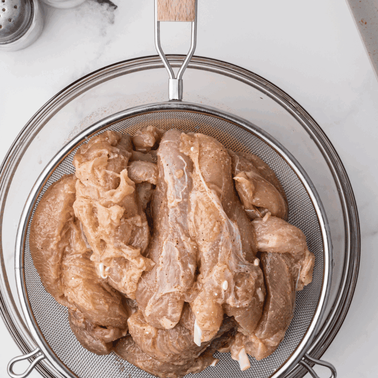 Season the chicken tenders with salt and black pepper.