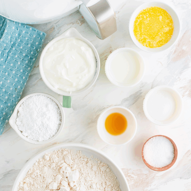 Ingredients needed for Air Fryer Greek Yogurt Donuts on kitchen table.