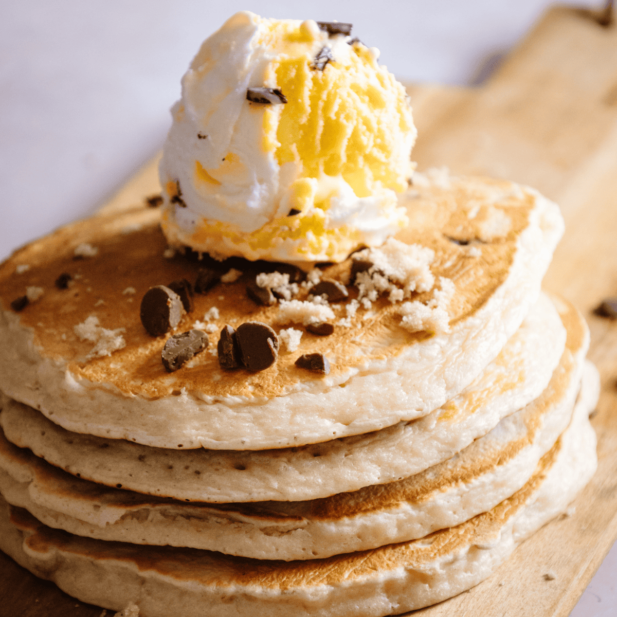 Fluffy and delicious, these Banana Chocolate Chip Air Fryer Pancakes are the perfect quick breakfast or brunch idea. Easy to make, kid-friendly, and packed with sweet banana flavor and melty chocolate chips!