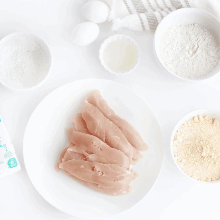 Ingredients needed for Bob Evan's Hand-Breaded Chicken Tenders Recipe on kitchen table.
