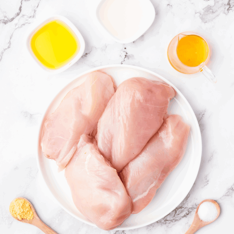 Ingredients needed for Bob Evan’s Lemon Garlic Chicken Recipe on kitchen table.
