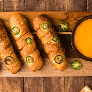 Creamy homemade Copycat Auntie Anne’s cheese dip served with soft pretzels.