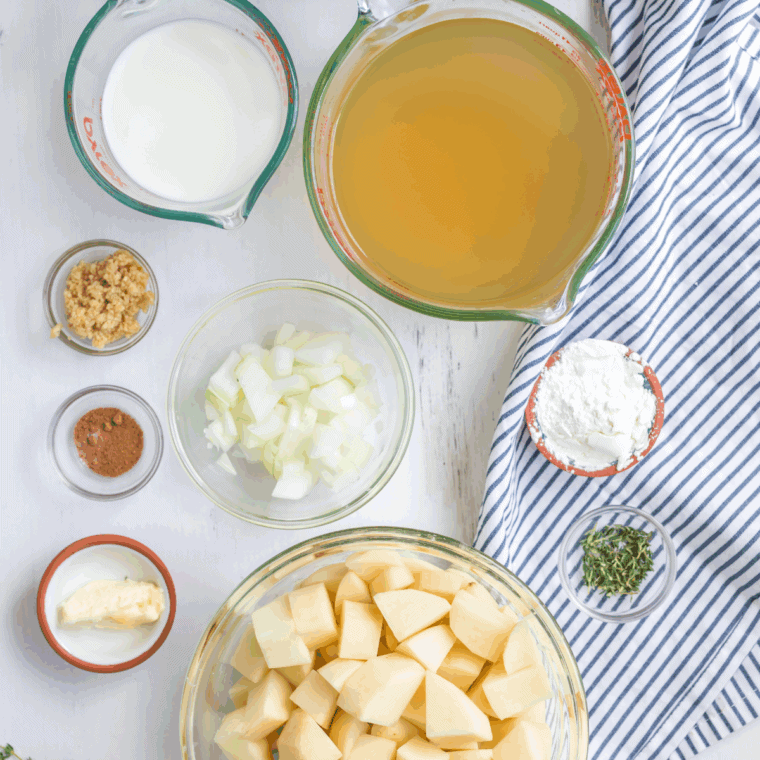 Ingredients needed for Copycat Bob Evan's Cheddar Baked Potato Soup on kitchen table.