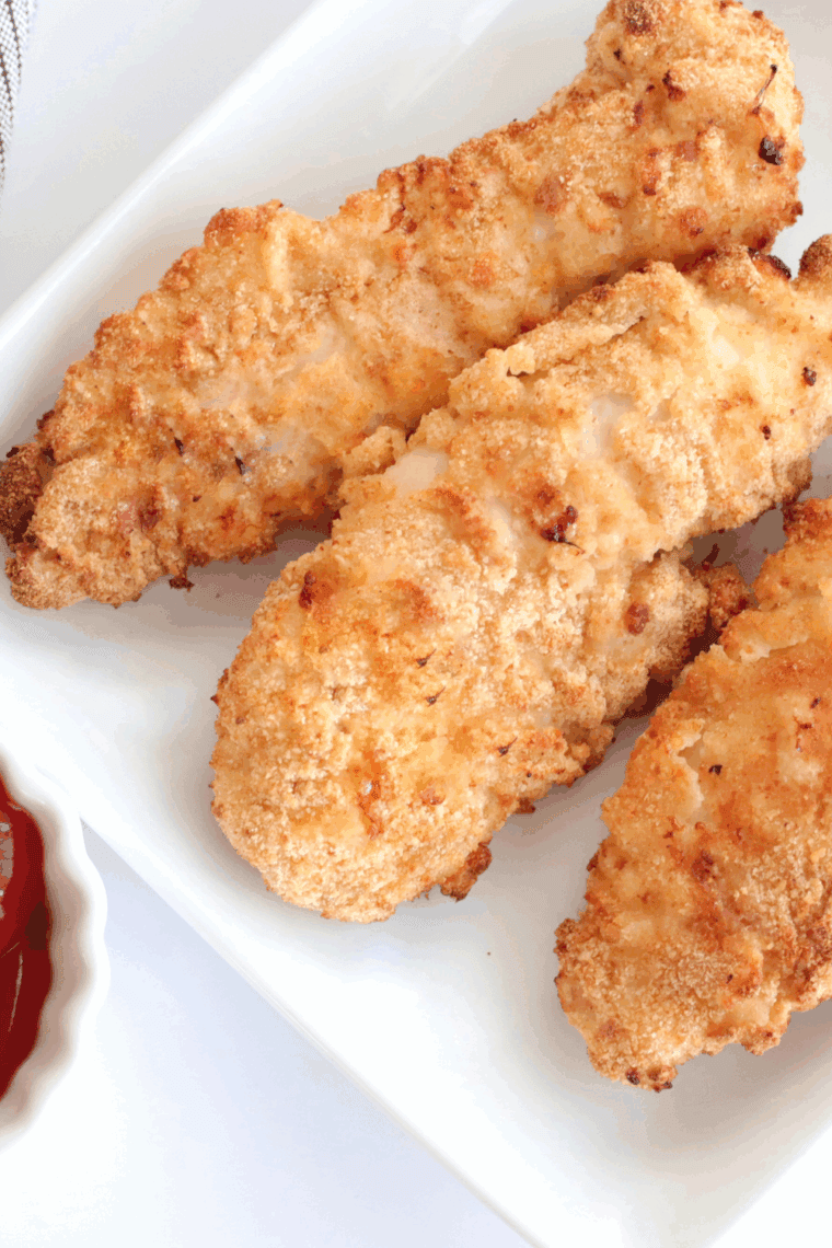 Homemade Dairy Queen-style chicken strips, crispy and golden, served with dipping sauces