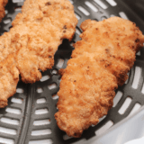 Air fryer homemade Dairy Queen-style chicken strips golden and crispy on a plate