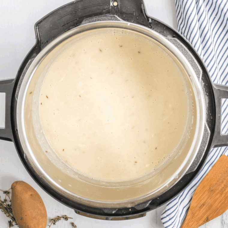 Finish and serve: Creamy Irish Potato Soup garnished with fresh parsley, ready to serve hot.