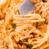 Make creamy, cheesy Crockpot Million Dollar Pasta with tender pasta, savory ground beef, and a rich blend of cheeses. A family-friendly slow cooker dinner that’s easy, comforting, and irresistible!