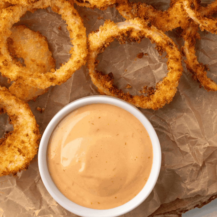 Homemade Dairy Queen Brazier Burger Sauce copycat served in a small bowl with a spoon, ready for spreading on burgers.