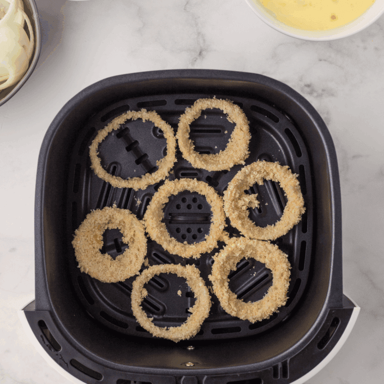 Place coated onion rings in the air fryer basket.