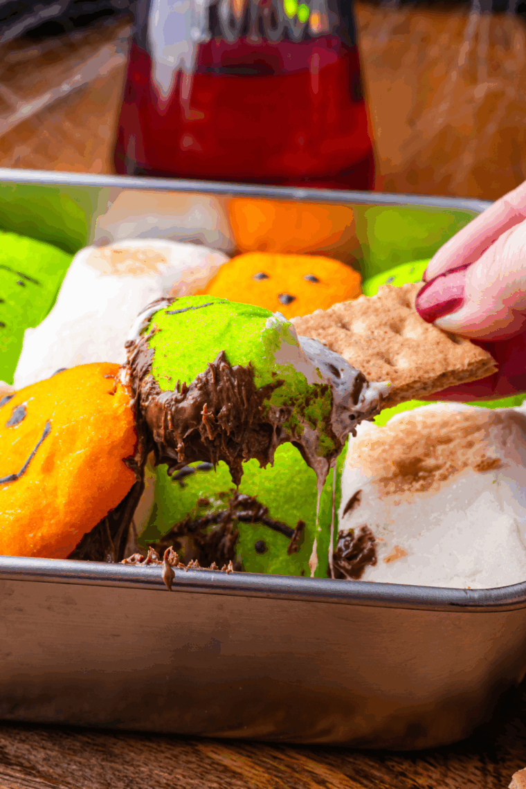 Close-up of toasted marshmallows on Halloween s’mores dip