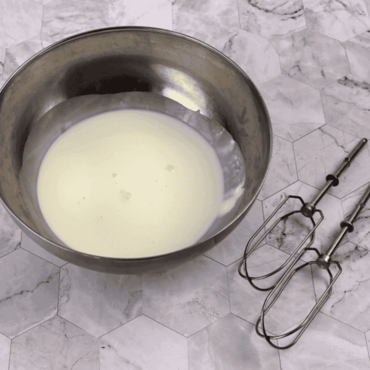 In a small saucepan whisk together the sugar, cornstarch, salt and milk. 