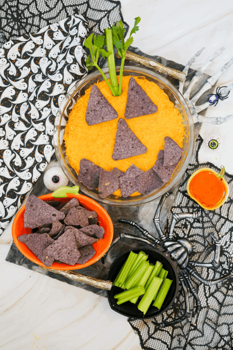 Halloween Boo-falo Wing Dip is warm in a festive dish and fries.