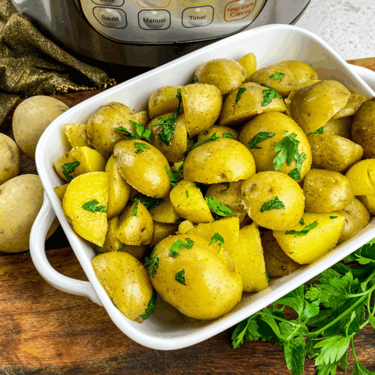 Tender diced potatoes cooked in the Instant Pot, seasoned and ready to serve.