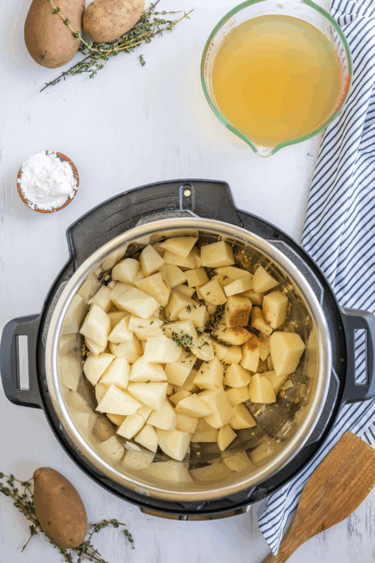 Place potatoes and seasonings into the Instant Pot.