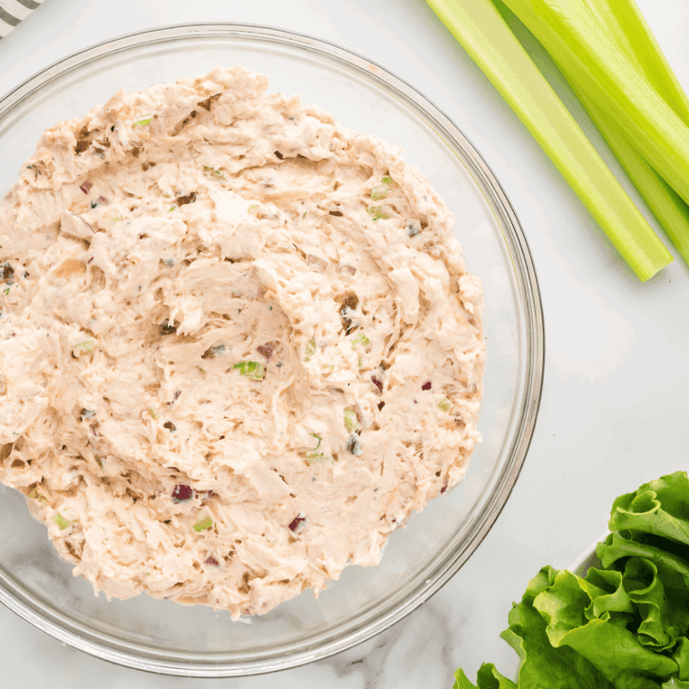 Add chicken and optional nuts. Mix gently until evenly coated.