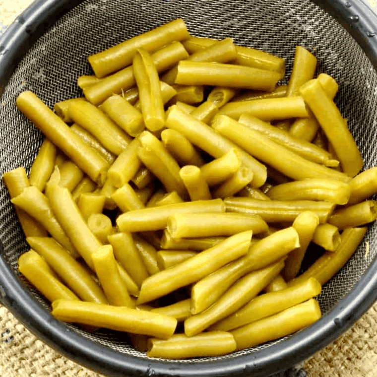 Drain the green beans, and rinse.