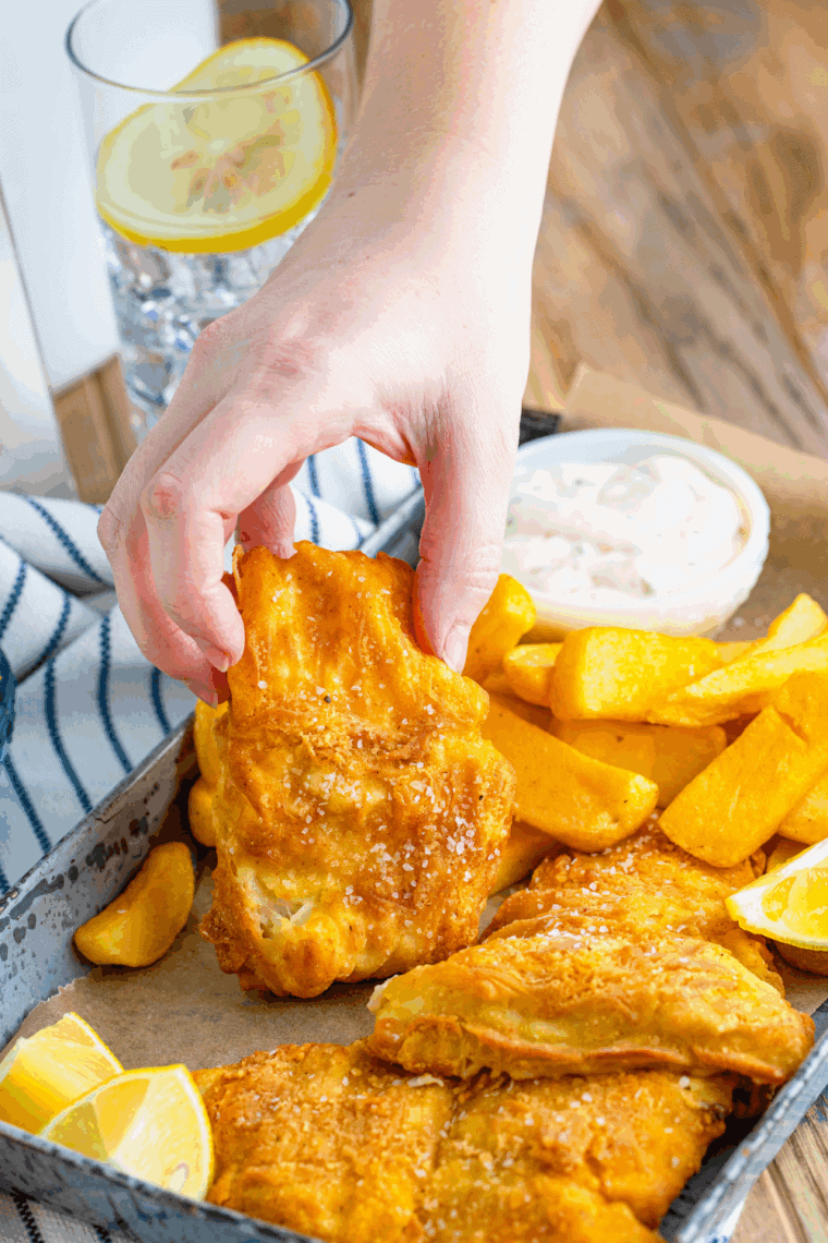 Crispy Long John Silver’s copycat fish with golden batter, served with lemon wedges.