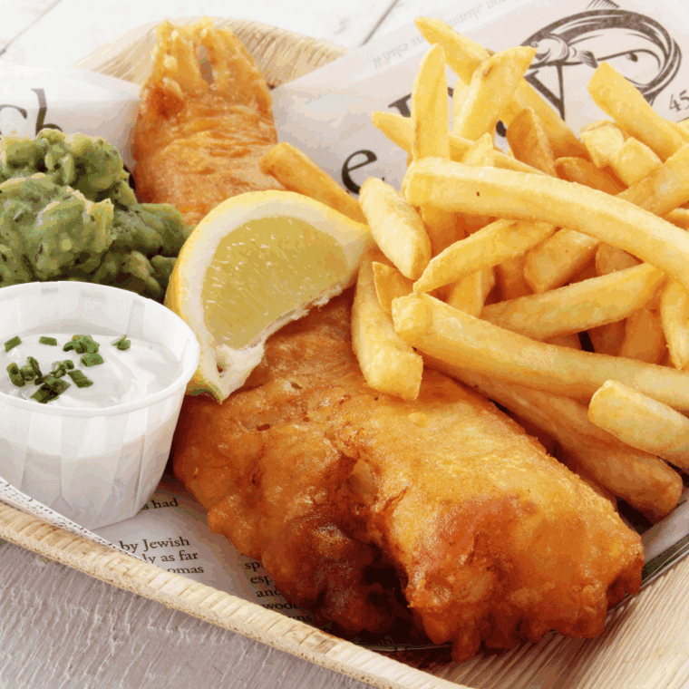 Crispy Long John Silver’s copycat fish with golden batter, served with lemon wedges.
