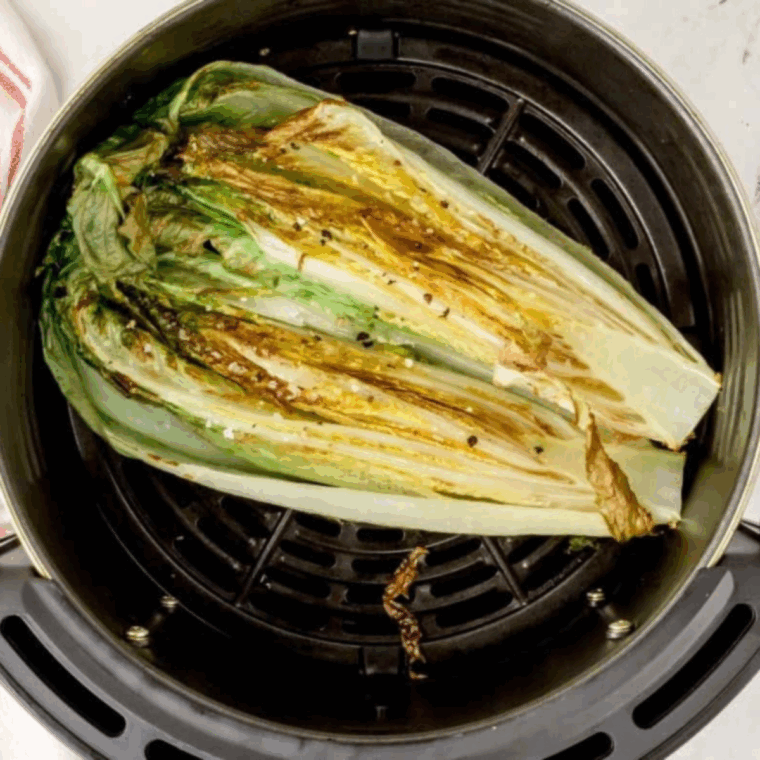 Place Caesar salad in the air fryer basket.
