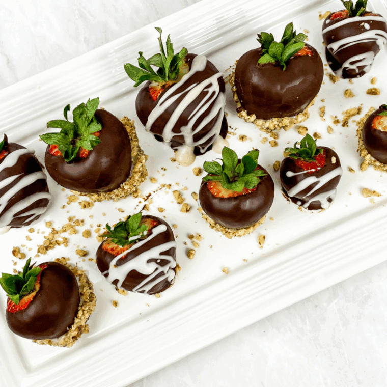 Homemade Shari’s Berries chocolate-covered strawberries Dipped in decadent chocolate and decorated with drizzles or sprinkles.