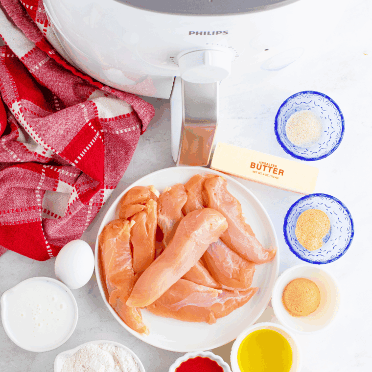 Ingredients needed for Nashville Hot Chicken Nuggets (Cheesecake Factory Copycat Recipe) on kitchen table.