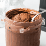 “Bowl of Ninja Creami Blue Bell Dutch Chocolate ice cream with chocolate chunks.”