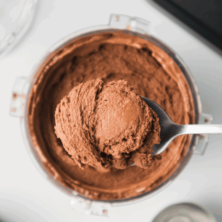 Bowl of homemade Ninja Creami Bluebell Dutch Chocolate ice cream with a smooth, creamy texture and rich chocolate flavor.