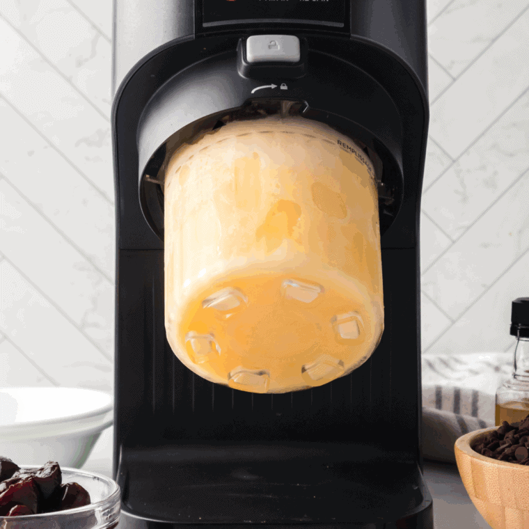 Processing frozen pint in Ninja Creami on Ice Cream setting for creamy texture.