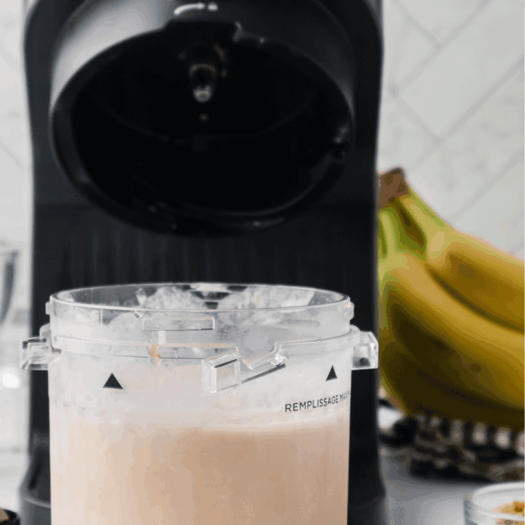 Place Ninja Creami pint container in the machine.