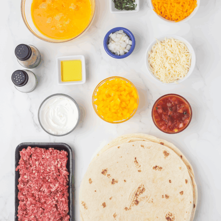 Ingredients needed for Taco Bell Copycat Breakfast Quesadillas on kitchen table.