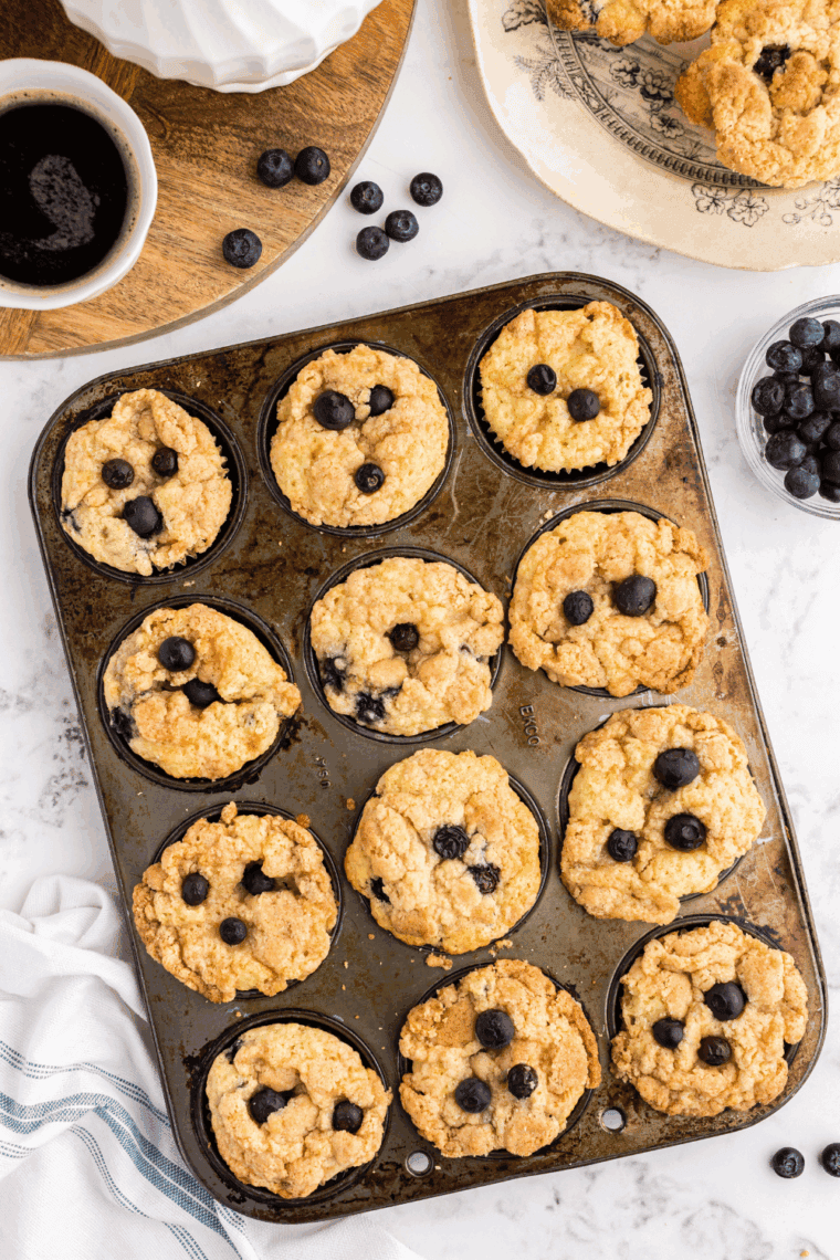 Close-up of golden, fluffy Tim Hortons-style blueberry muffins
