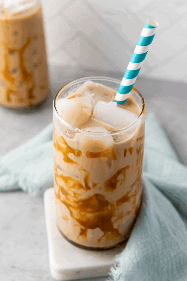 Homemade Tim Hortons-style iced capp served in a glass with straw.