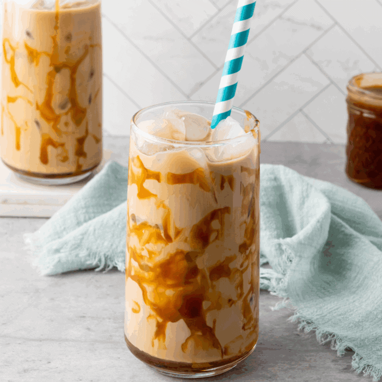 Copycat Tim Hortons iced coffee with milk and ice cubes.
