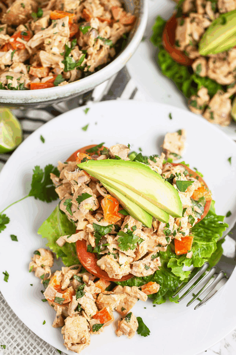 Creamy Waldorf-Astoria Thousand Island dressing in a bowl with a spoon, ready to serve over salads or sandwiches.