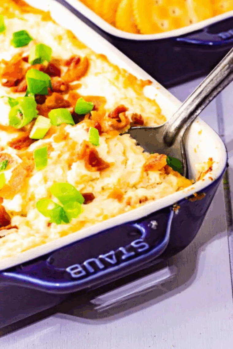Melting cream cheese and chili together in a saucepan.