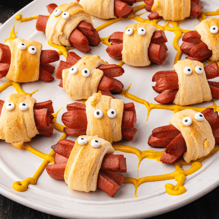 Spider-shaped hot dogs cooked in the air fryer, perfect for Halloween snacks