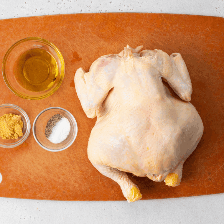 Ingredients needed for Barefoot Contessa Cornish Hen Recipe on kitchen table.