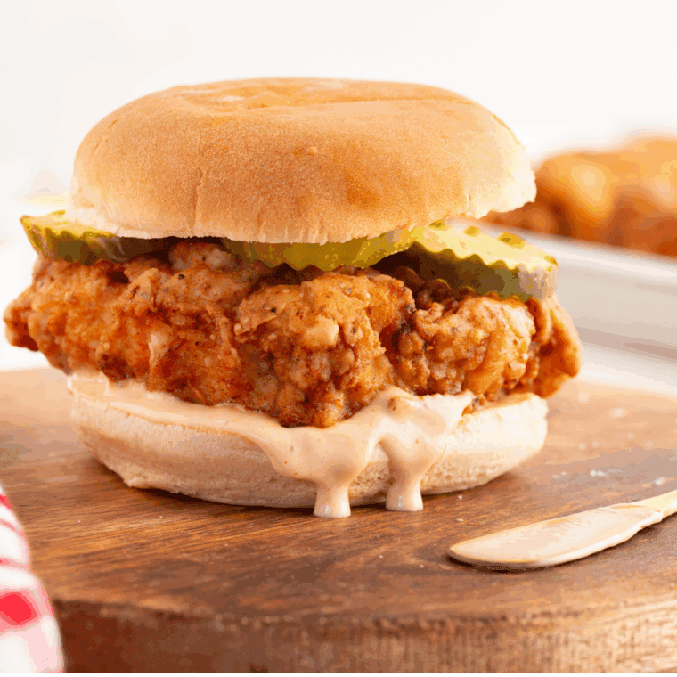 Copycat A&W Chubby Chicken Sandwich ready to serve on a plate.