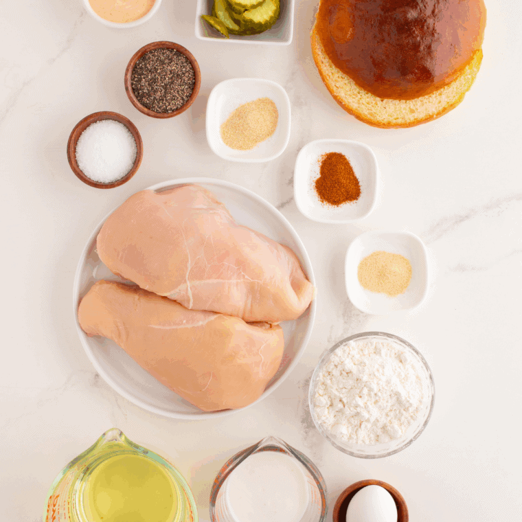 Ingredients needed for Copycat A&W Style Chubby Chicken Sandwich Recipe on kitchen table.
