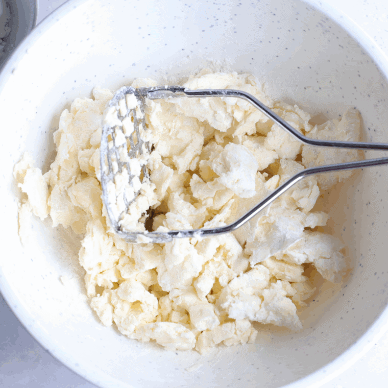 Beating unsalted butter with granulated and brown sugar until light and fluffy in a large bowl.