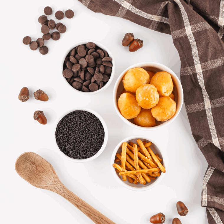 Ingredients needed for Easy Acorn Donut Holes on kitchen table.