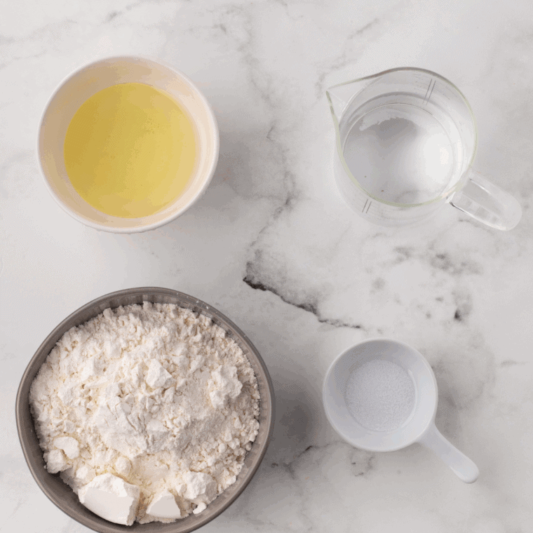 Ingredients for homemade flour tortillas in an easy air fryer on the kitchen table.