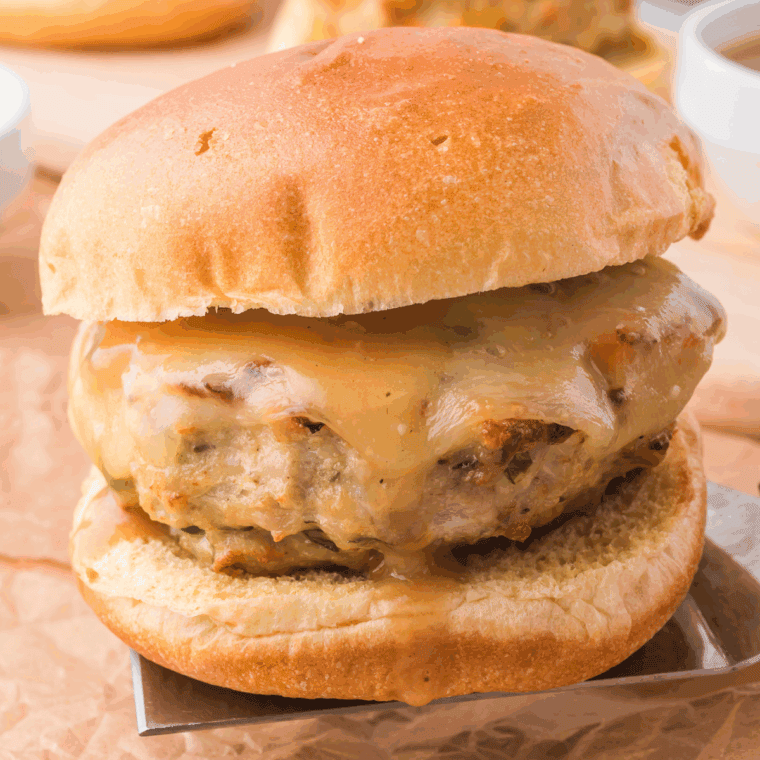 Juicy Barefoot Contessa turkey burger served on a toasted bun with toppings