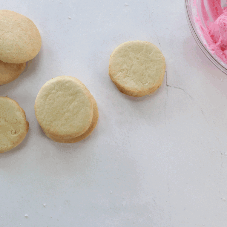 Baking sugar cookies in the oven until edges are set and centers remain soft
