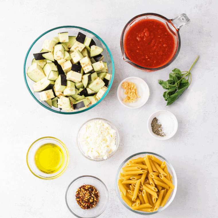 Ingredients needed for Easy Ina Garten's Marinara Sauce on kitchen table.