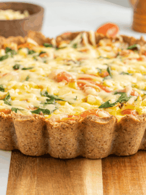 Golden-baked Ina Garten quiche with cheesy, creamy filling and fresh herbs.